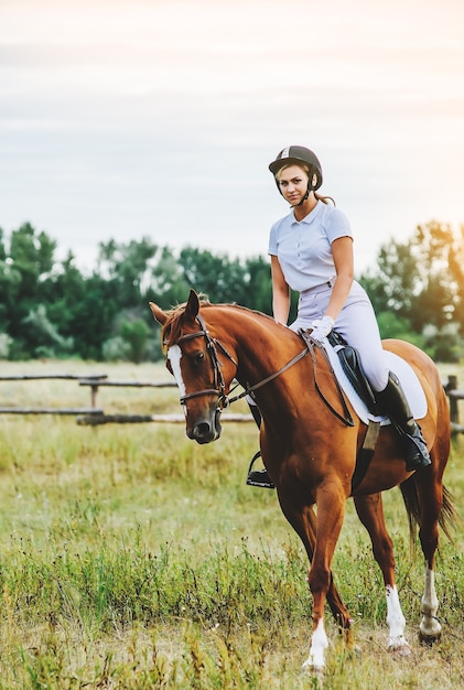 Girl jockey riding a horse