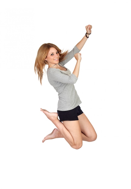 Girl jumping isolated on a over white background