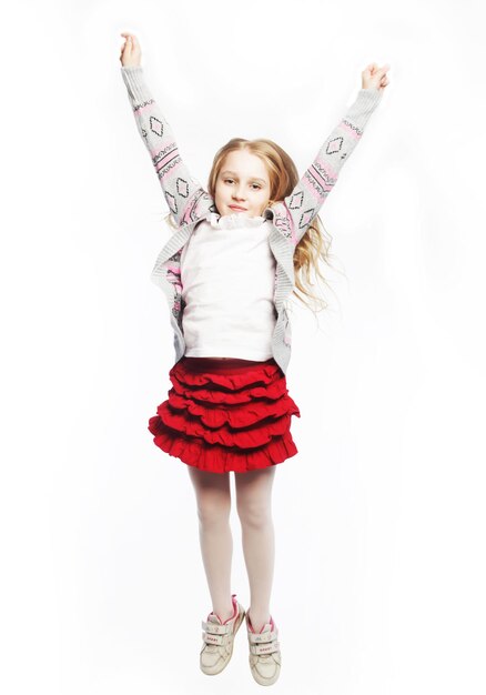 Girl jumps on a white background