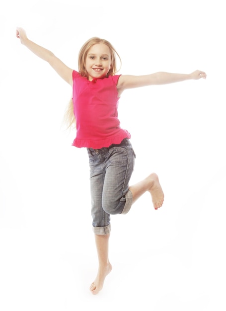 Girl jumps on a white background