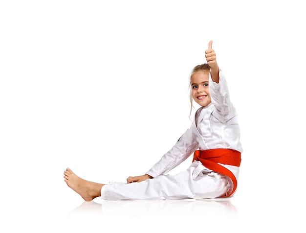 Girl in a kimono showing thumb up