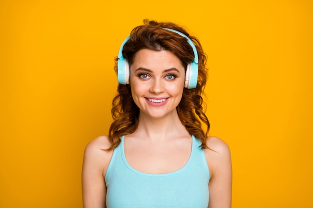 girl listens to music on headphone