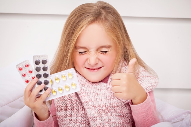 Girl Looking At Cold And Flu Pills