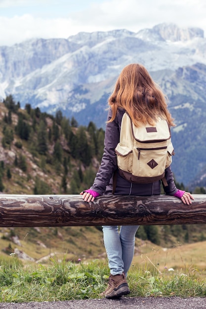 Girl looking at the mountains