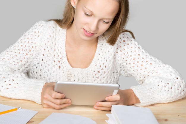 Girl looking at a tablet