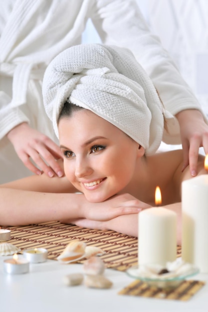 Girl lying down on a massage bed