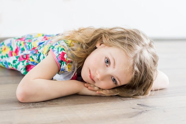 Girl lying on floor and deams something