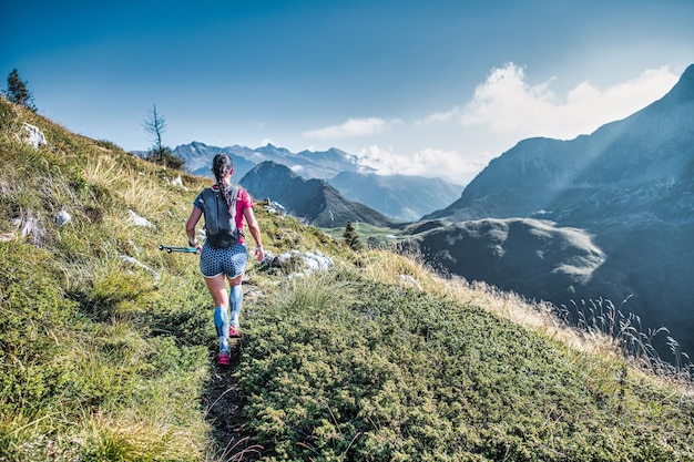 A girl during a mountain trail