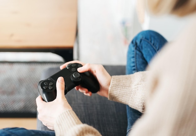 Girl playing on games console