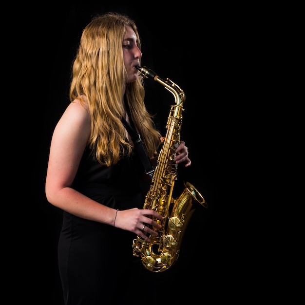 Girl playing the saxophone