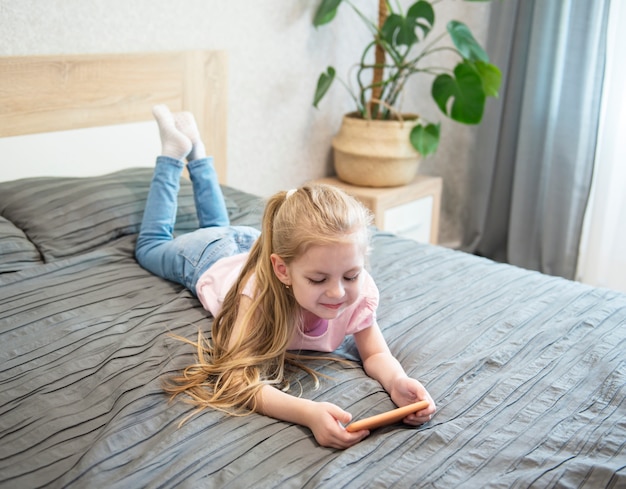 Girl playing on smartphone