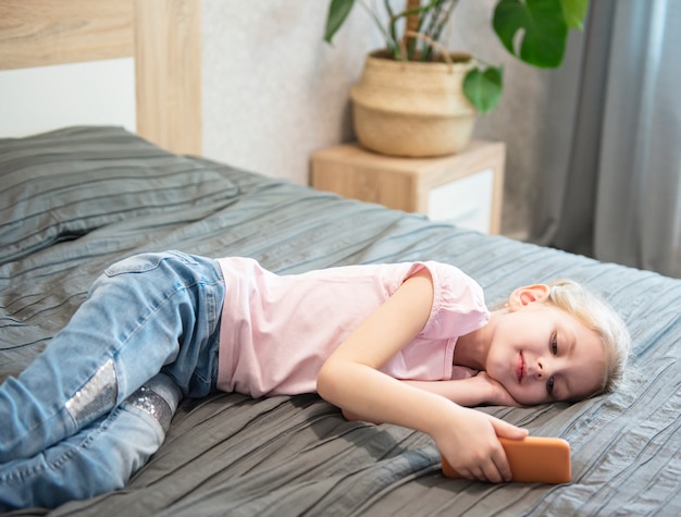 Girl playing on smartphone