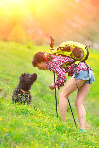 Girl playing with her dog