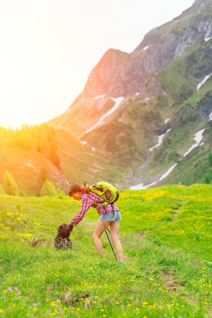 Girl playing with her dog