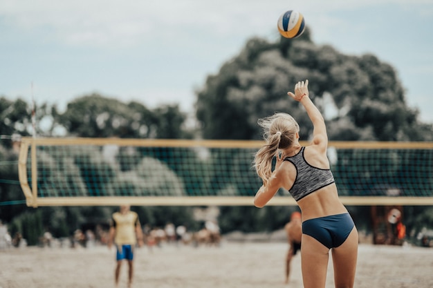 Girl plays volleyball