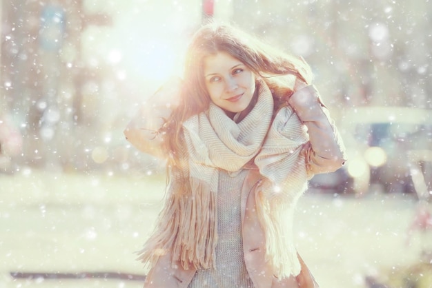 girl portrait by the first snow