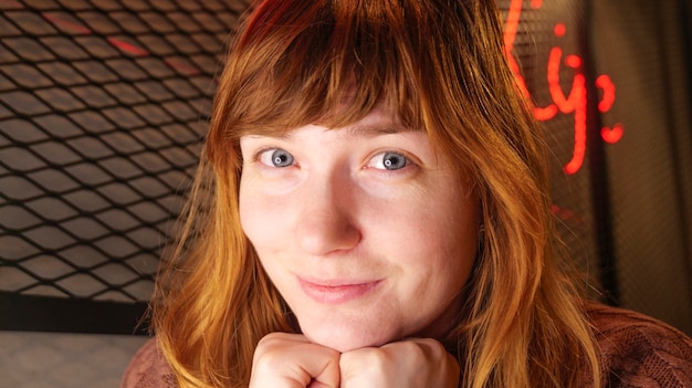 Girl portraits face of a redhaired girl closeup