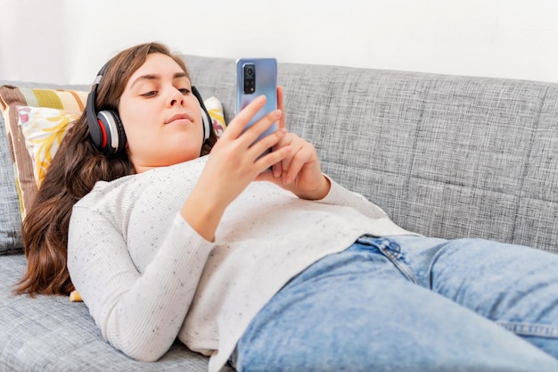 Girl reading message in a smart phone