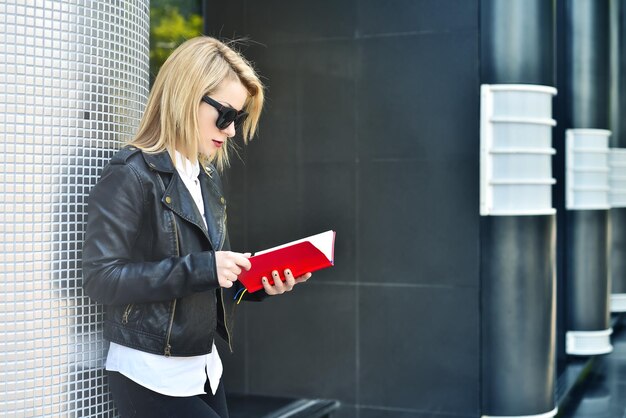 Girl reading red book