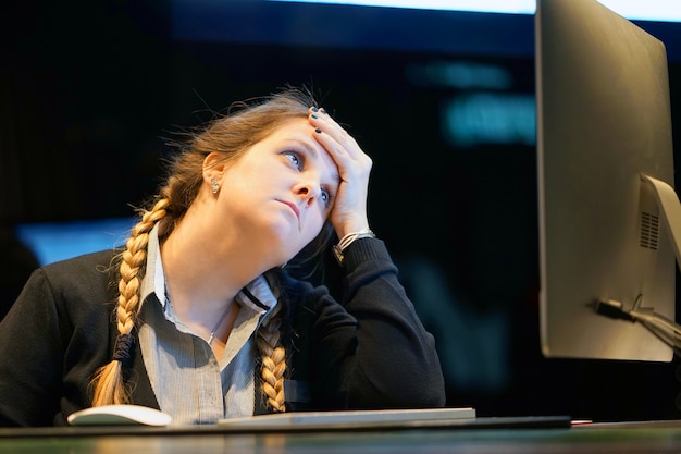 The girl's headache. Girl squeezes her head