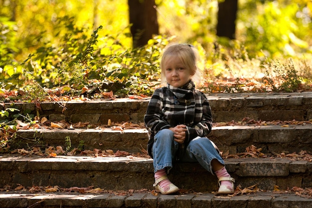 Girl sitting on a stairs