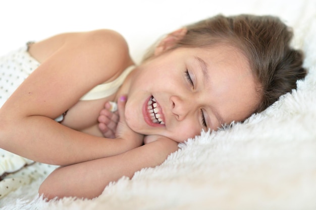 Girl sleeping in bed