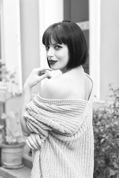 Girl smile with brunette hair red lips in paris france