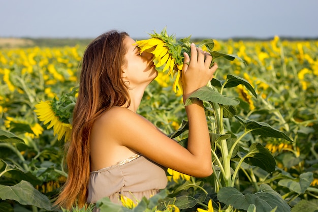 The girl in the sunflower field , the big , emotional girl