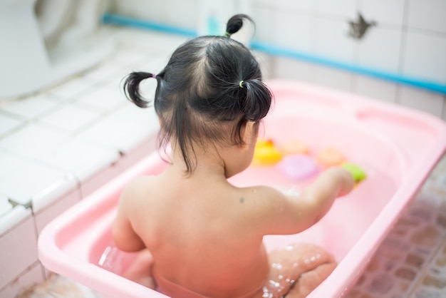 Girl taking a bath