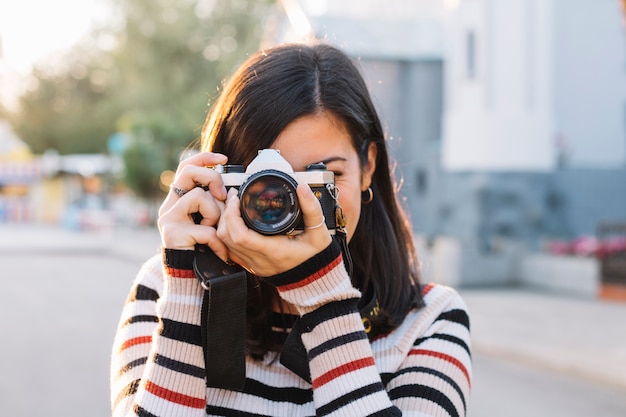 Girl taking a photo