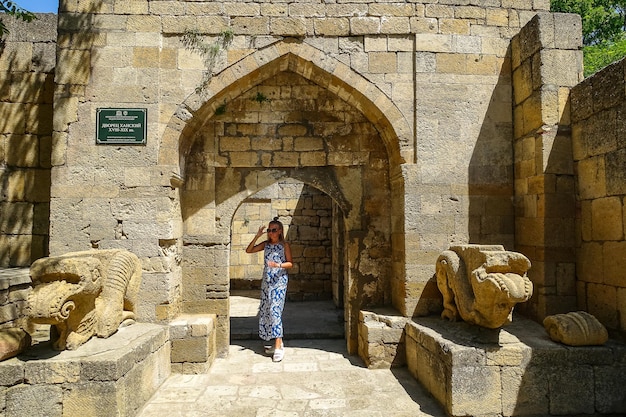 A girl on the territory of the NarynKala Fortress in Derbent Dagestan Russia June 2021