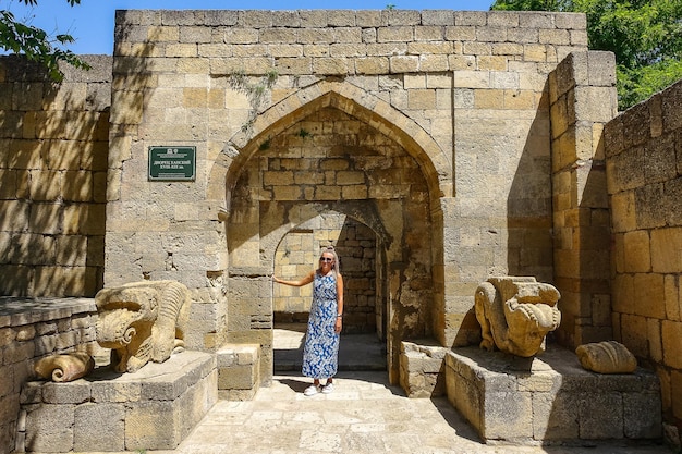 A girl on the territory of the NarynKala Fortress in Derbent Dagestan Russia June 2021