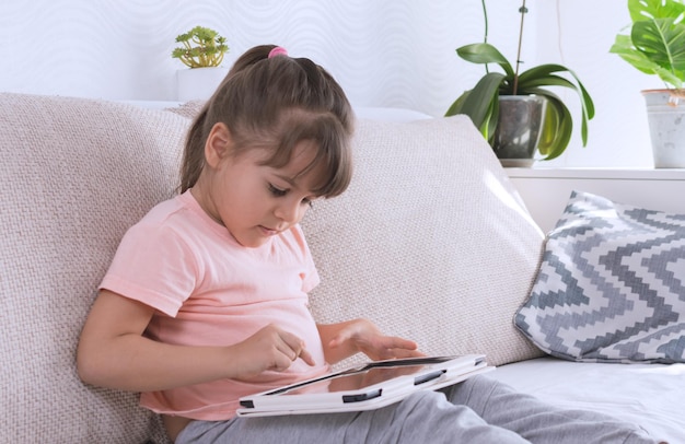 Girl using Phone smartphone viewing screen on phone or tablet press browsing close up hands