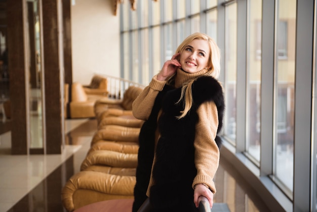 Girl waiting for the arrival of the aircraft