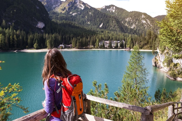 Girl walk around the lake Braies