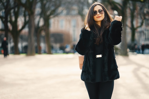 girl walking aroung the streets and the city of Paris France