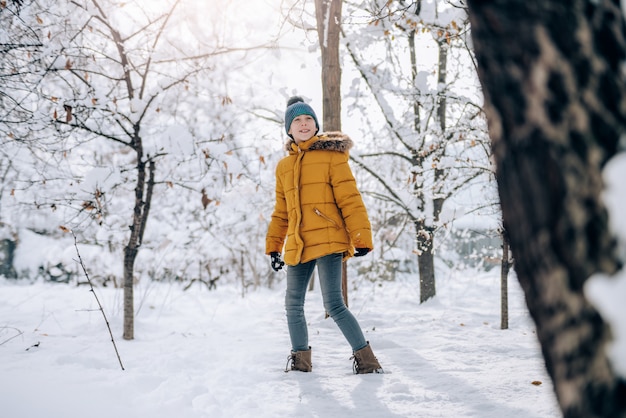 Girl walking on a fresh snow