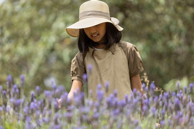 Girl walking on lavender field