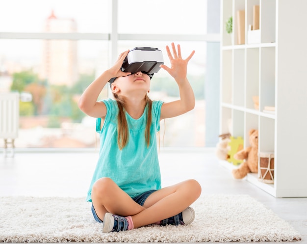 Girl wearing virtual reality glasses