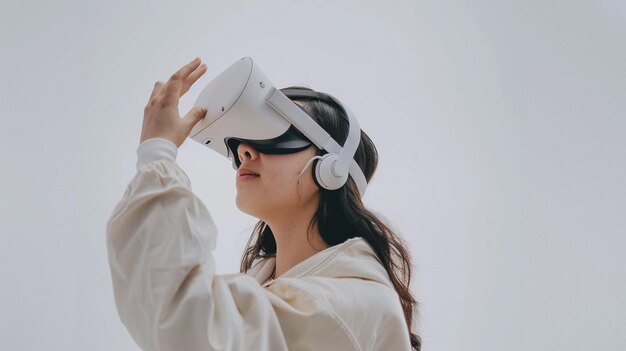 Photo a girl wearing vr headset against white background vertual reality concept