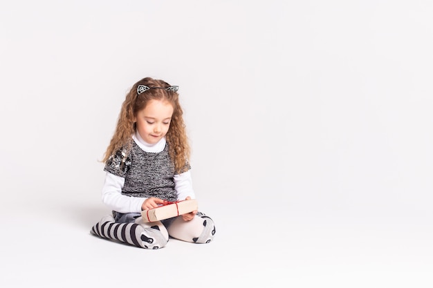 girl on white with small gift