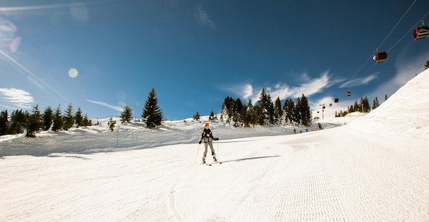 Girl at winter skiing bliss a sunny day adventure