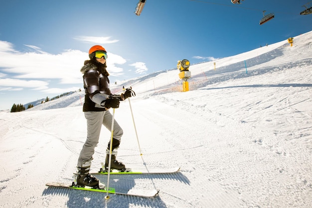 Girl at winter skiing bliss a sunny day adventure