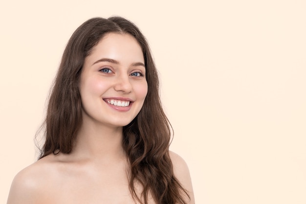 Girl with blue eyes and long hair smiling