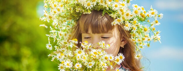 Girl with chamomile. photo. nature flowers.