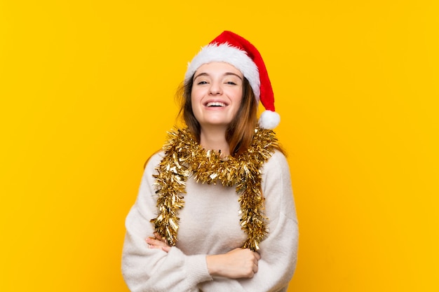 Girl with christmas hat laughing