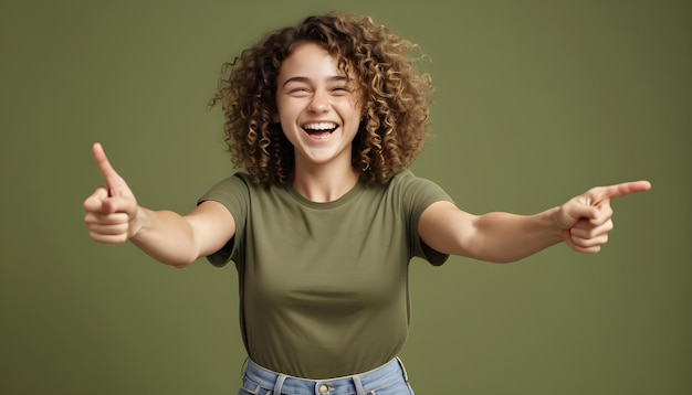 a girl with curly hair smiling and pointing at the camera