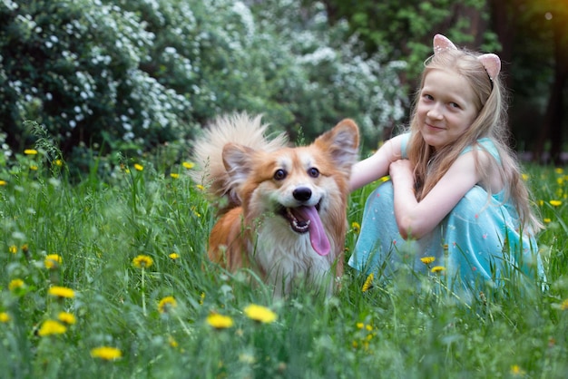 Girl with dog outdoors