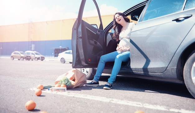 Girl with food coming out of the grocery store