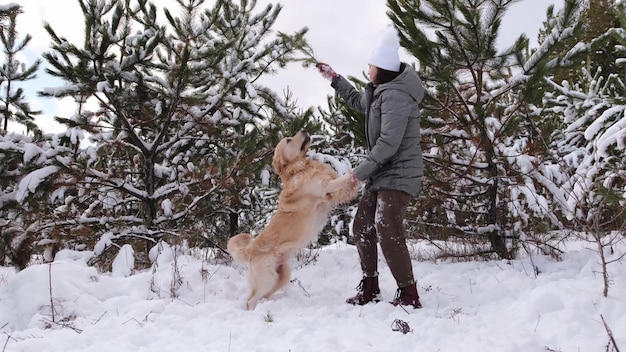 Girl with golden retriever dog